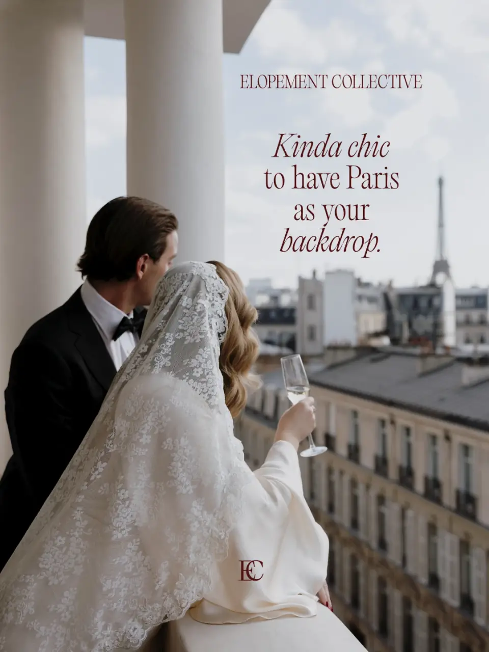 A bride in a lace veil holding a glass of champagne on a Paris balcony with the Eiffel Tower behind her. Kinda chic to have Paris as your backdrop.
